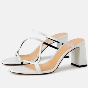 Zara white wide heeled strappy sandals.